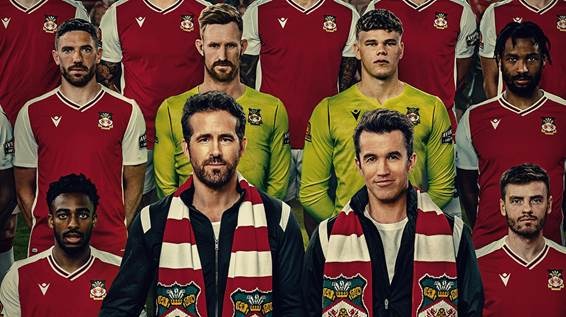 Grupo de pessoas posando para foto de uniformeO conteúdo gerado por IA pode estar incorreto.