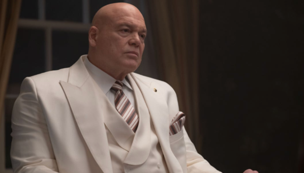 A person in a white suitAI-generated content may be incorrect.